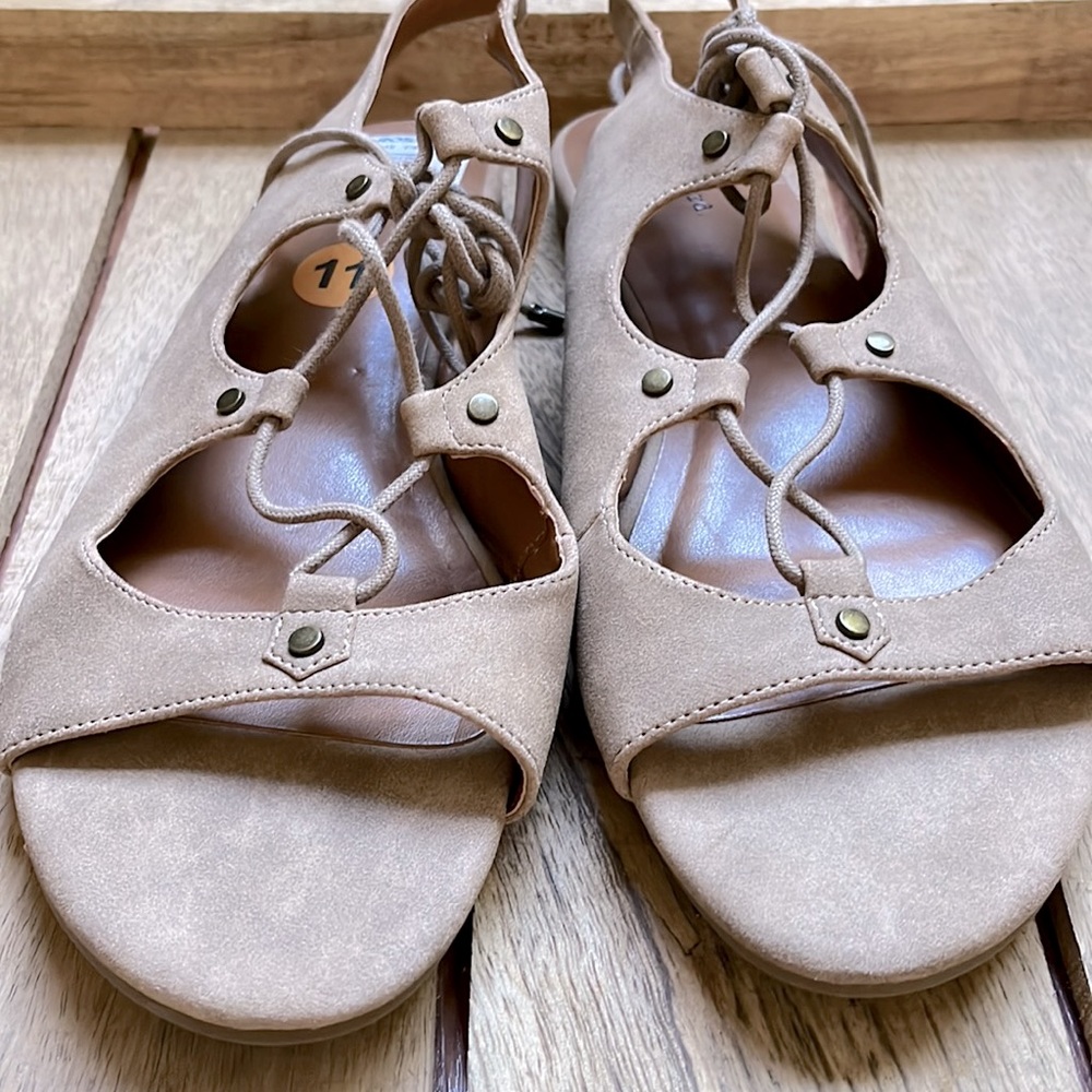 Cute suede-like tan lace up sandals. Peep toe, sling back. New with tags.